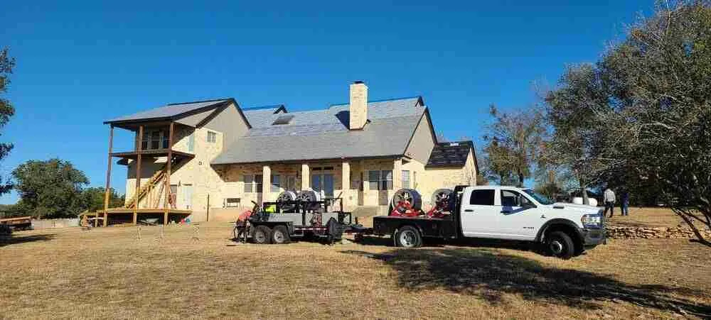 Metal roofing crew preparing to work on home