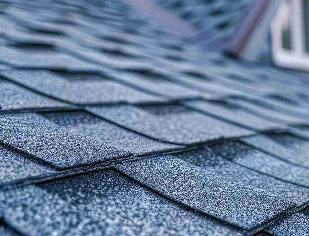 Roof Shingles Close-up. House roof, background with copy space. Tiles Roof shingles with garret.